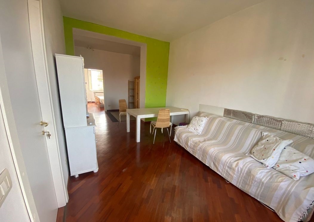 Ampio Bilocale di 77 m² in Palazzo d’Epoca – Box Auto e Portineria